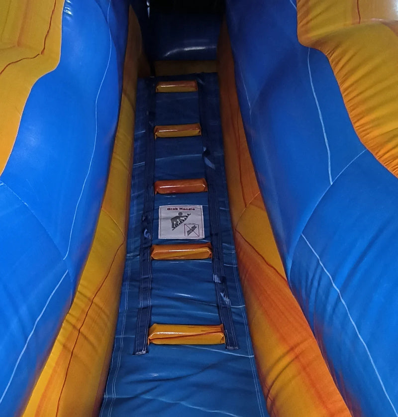 Blue and orange inflatable slide with a central ladder