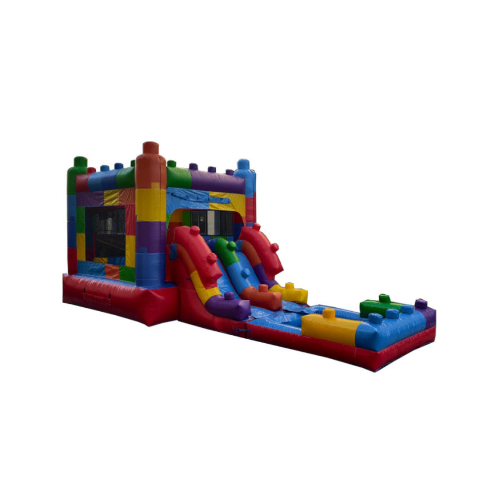 Colorful inflatable bounce house with slide on a white background -- side view
